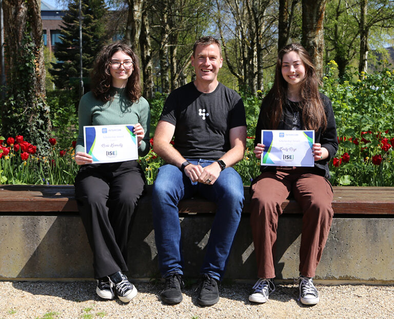 Des Traynor of Intercom pictured with Emily Roys and Rosie Kennelly